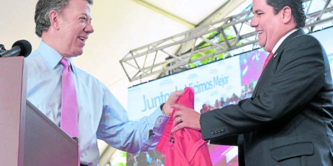 Juan Manuel Santos y Germán Arce.